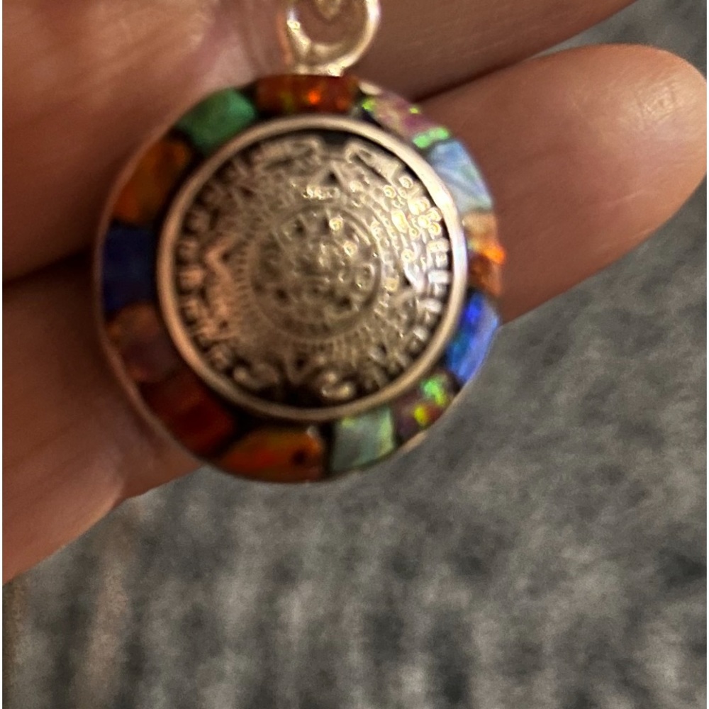 Aztec Calendar pendant from Michael’s Gallery artist from Mazatlan, Mexico.
